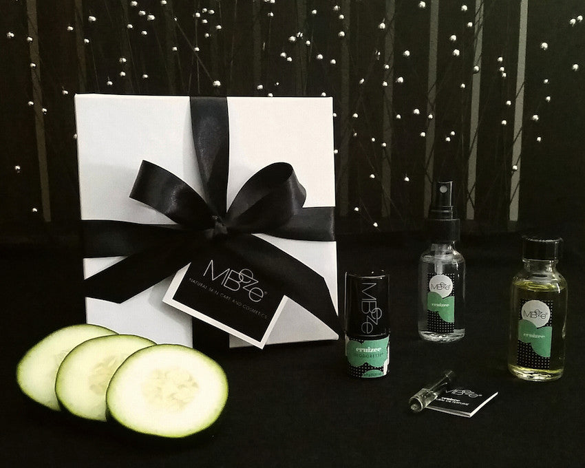 MBeze Cruizee Mini Gift Set with gift box, including Deodorette, Body Mist Traveler, Body Oil Traveler, and Perfume Sample.