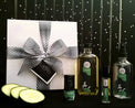 Cruizee Deluxe Collection with gift box, Deodorette, Body Oil, Perfume, Body Mist, and cucumber slices.