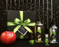 Once Bitten Deluxe Collection with gift box and apple. Including Deodorette, Body Oil, Perfume, and Body Mist.