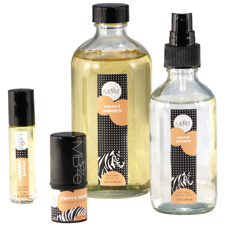 MBeze Sweet Sanura Deluxe Collection, including Perfume, Deodorette, Body Oil, and Body Mist.